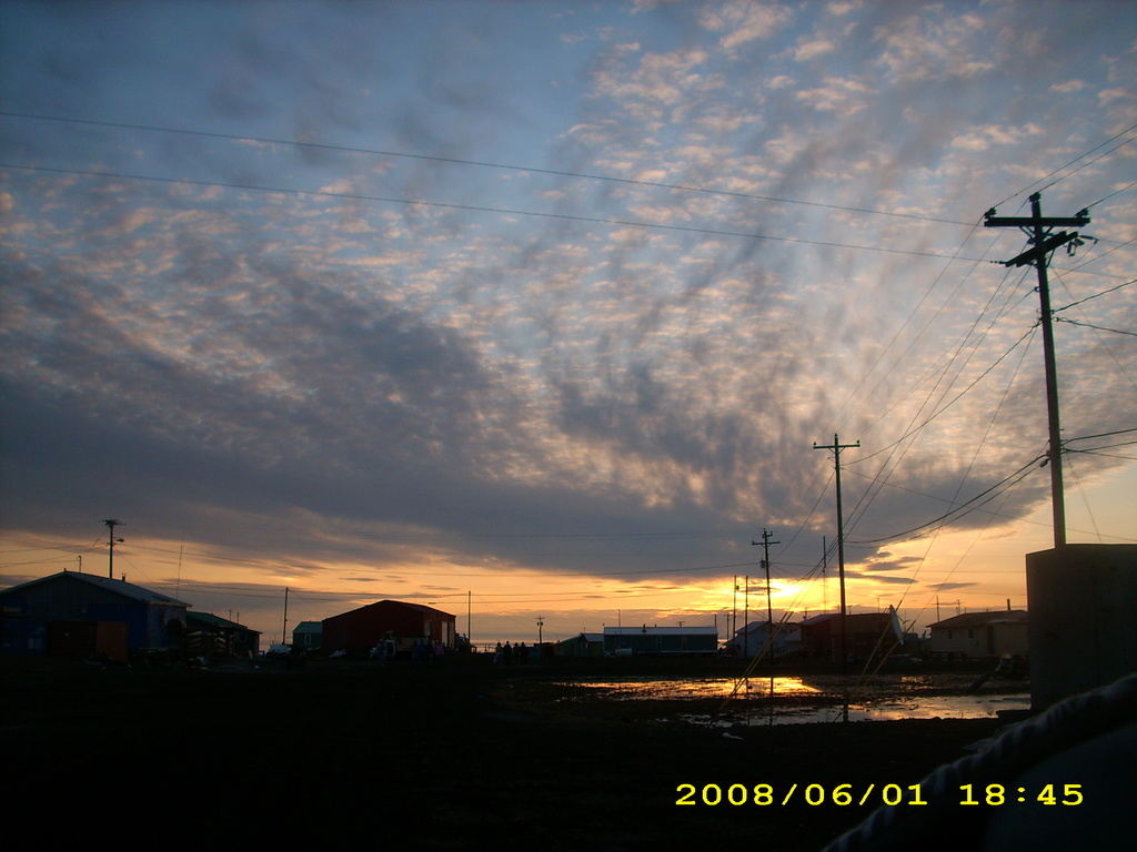 Savoonga, AK: How one Savoonga sunset looks like in town during the summers.