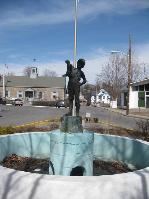Ellenville, NY: Boy with boot statue