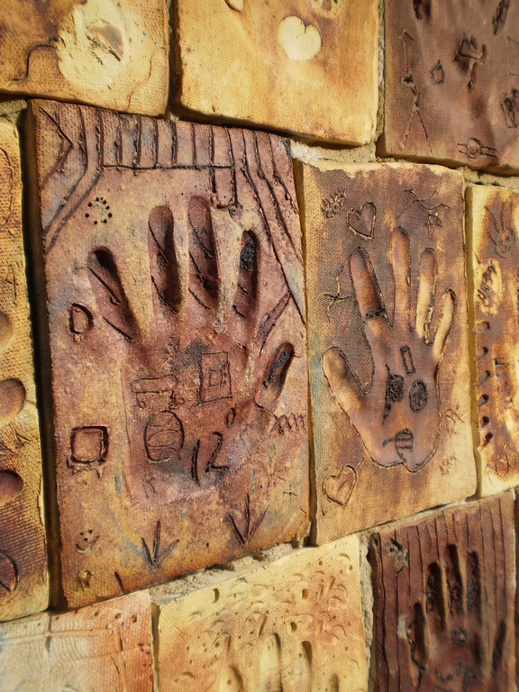 Maysville, KY: Handprints in Clay decorate the Tunnel to the River Pier in Maysville