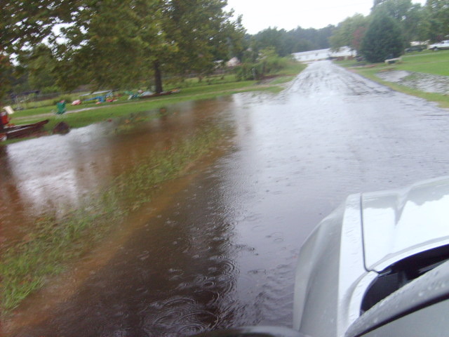 Hooks, TX: Driving through water toward Twin Oaks