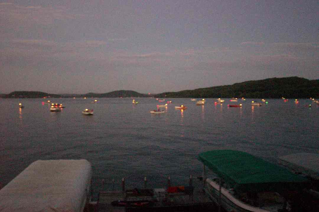 Merrimac, WI: Shot from 121 River Street looking East out at Lake Wisconsin in Merriamac. Boats are waiting for July 4th Fireworks Show!