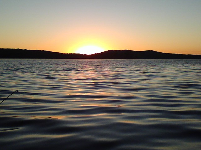 Senecaville, OH: Sunrise on Scenecaville Lake.