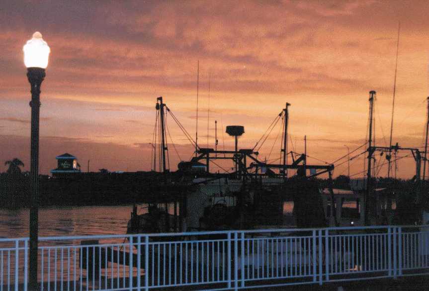 Punta Gorda, FL: Commercial Fishing Vessels nestled in their slips at sunset in the City's Laishley Park Marina