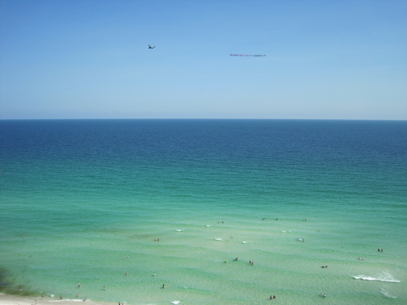 Gulf Breeze, FL: Banner tow over Navarre Beach Pier - Gulf of Mexico Navarre Beach FL