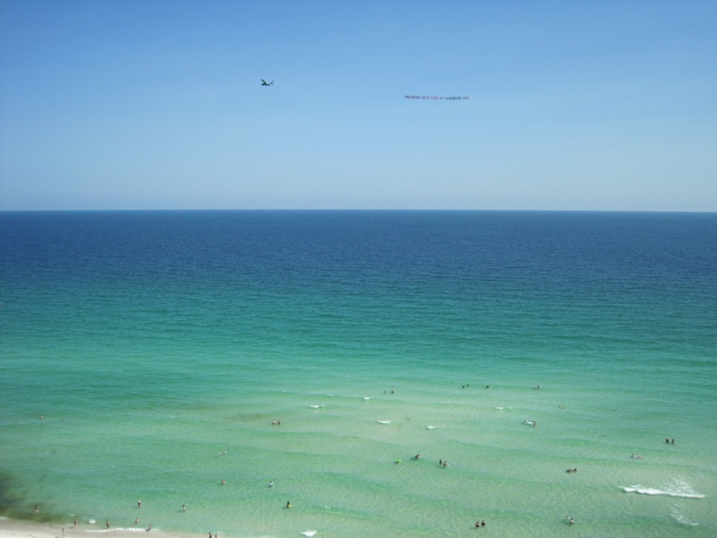 Gulf Breeze, FL : Banner tow over Navarre Beach Pier - Gulf of Mexico