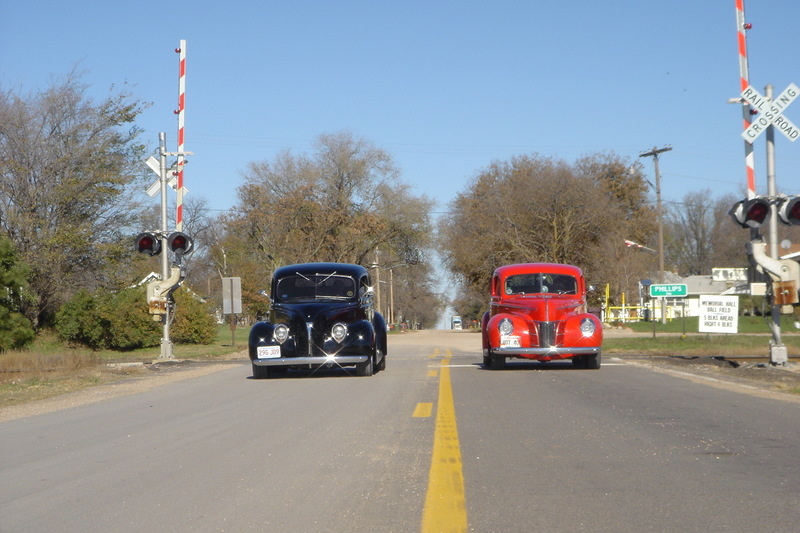 Phillips, NE: John Heinzman (40 Ford deLuxe Coupe) & Butch Gaudy (39 Ford Standard Coupe)