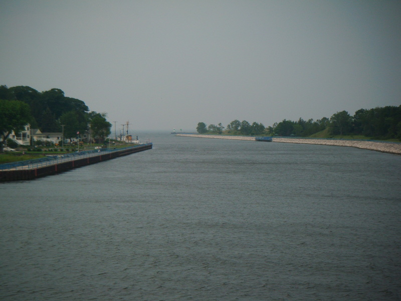 Muskegon, MI: Muskegon Channel leading into Lake Michigan. Muskegon State Park to the right.