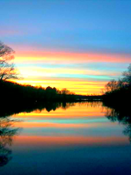 Millbury, MA: sunset ,looking over little Dorothy pond toward Big Dorothy pond