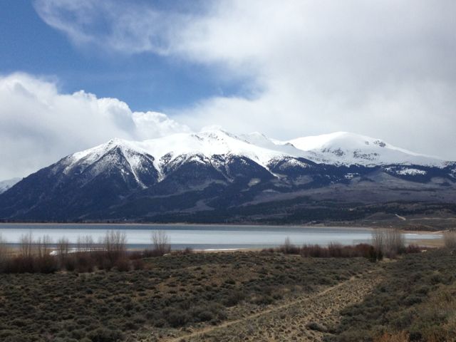 Twin Lakes, CO: Layer of ice on Twin Lakes looking up into the mountains. May, 2013