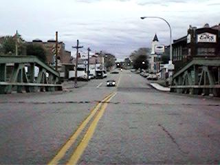 North Tonawanda, NY: A view of Sweeney Street in North Tonawanda User comment: This view is looking down Main Street, as seen from the Delaware St Bridge. The cross-street at the foot of the bridge is Sweeney Street.