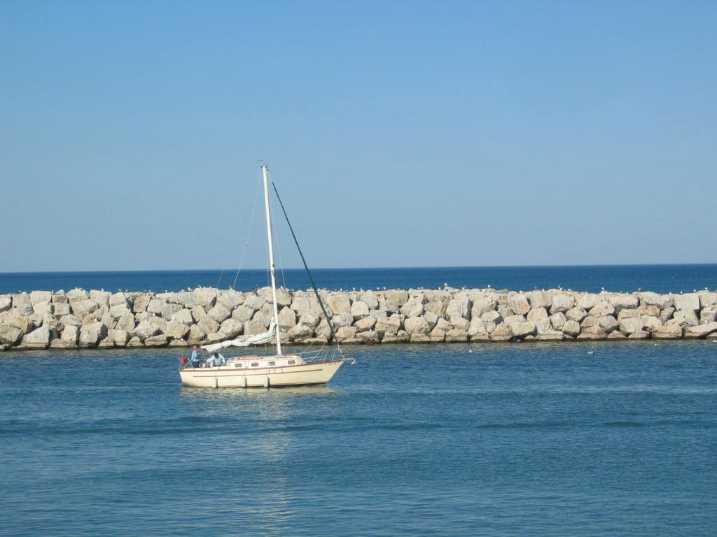 Winthrop Harbor, IL: North Point Marina - Sail boat leaving the harbor