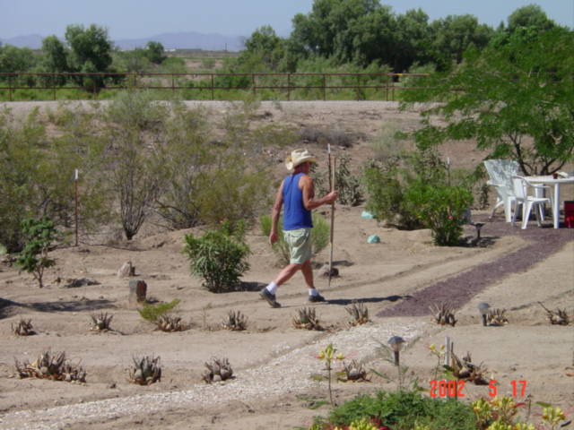 Marana, AZ: Ted working the soil