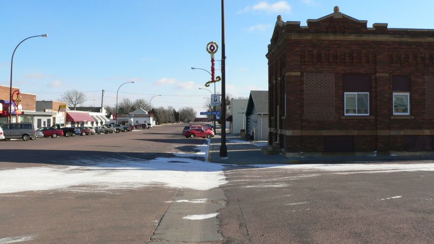 Corsica, SD: Historical Building observed eastward along Main Street in Corsica, SD