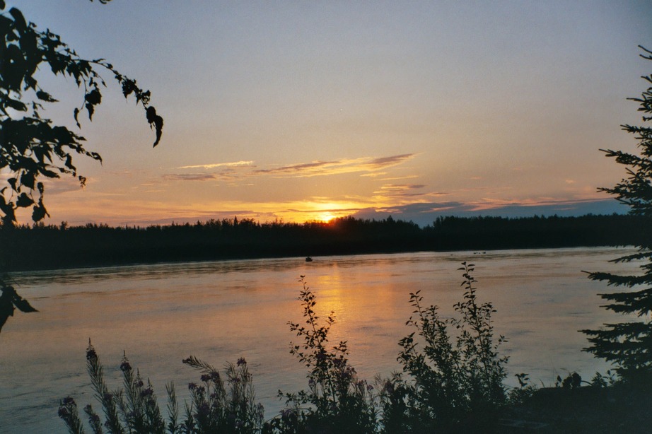 Nenana, AK: Sunset over the Nenan River. North of the city at an RV Park